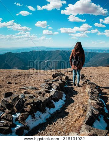 Beautiful Woman Hiking On Mountain Path During Winter Or Autumn In Catalonia (turo Del Home - Spain)