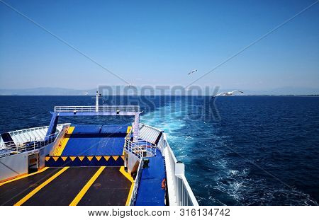Ferryboat On The Sea.   Ferryboat In The Aegean Sea - Mediterranean Sea - Thassos, Greece.