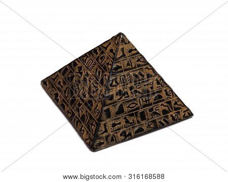 Pyramid Figurine Stands On A White Background