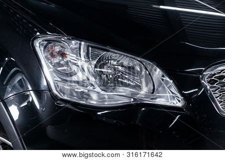 Novosibirsk, Russia - July 30, 2019:  Actyon Ssangyong, Close-up Of The Headlight, Bumper. Photograp