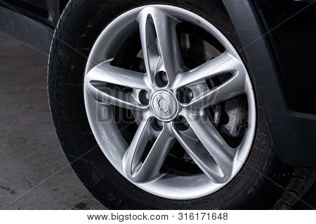 Novosibirsk, Russia - July 30, 2019:  Actyon Ssangyong, Close-up Of The Alloy Wheel. Photography Of 