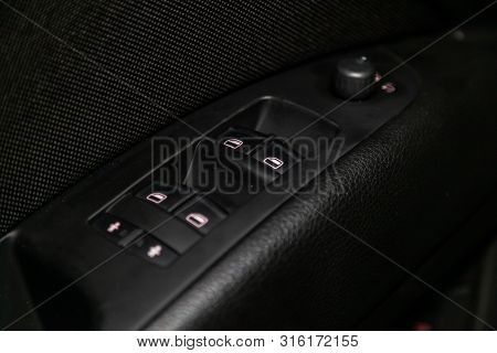 Novosibirsk, Russia - July 30, 2019: Audi Q7, Close-up Of The Side Door Buttons: Window Adjustment B
