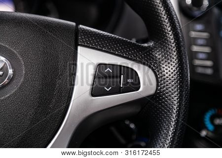 Novosibirsk, Russia - July 30, 2019: Lifan X60, Close-up Of The Multiwheel With Phone Setting And Vo