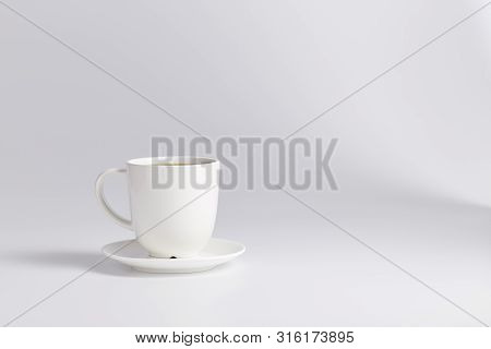 Empty White Cup Isolated On White
