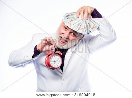 Money. Mature Man With Beard Hold Money. Clock Show Time. Time Is Money. Time Management. Business S