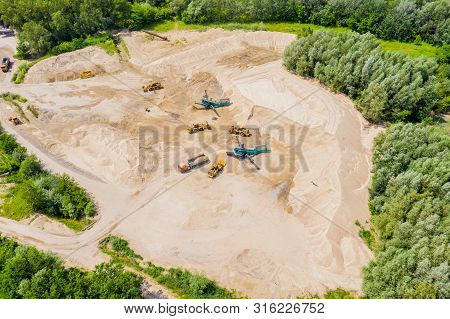 Aerial View Of Sandpit And Factory Plant Producing Sand Materials For Construction Industry. Top Vie