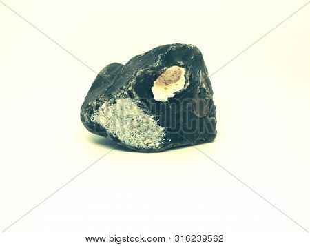 Chipped Obsidian Stone With Cavity Inside, Sharp Cracks Flint. Isolated Stone On White