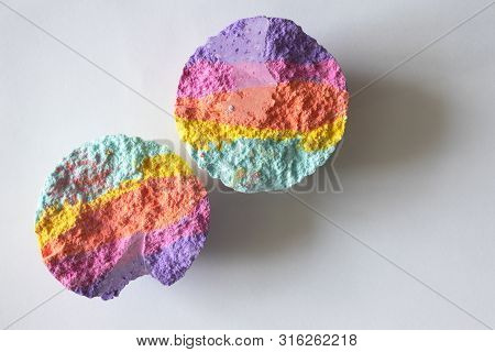 Halves Rainbow Bath Bombs On White Background