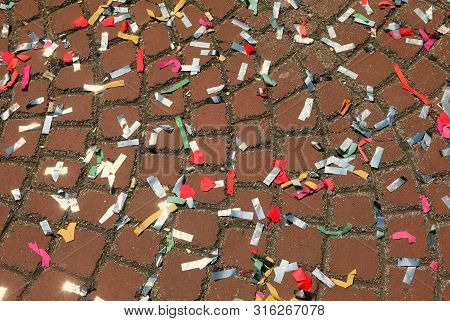 Colored Confetti During The Carnival Of Venice On The Paved Floor