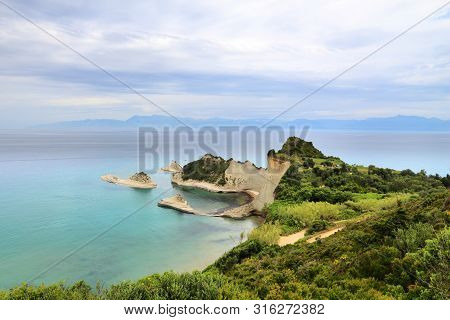 Corfu Island Landscape - Cape Drastis Coast In Greece. Ionian Sea Summer View.