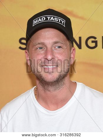 LOS ANGELES - JUL 23:  Ryan Tedder arrives for the 'Serengeti' Special Screening on July 23, 2019 in Beverly Hills, CA                