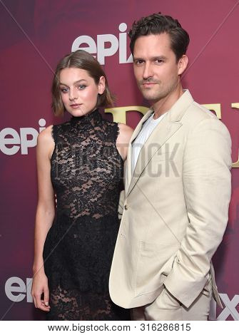 LOS ANGELES - JUL 24:  Emma Corrin and Ben Aldridge arrives for the Epix's 'Pennyworth' Los Angeles Premiere on July 24, 2019 in Hollywood, CA                