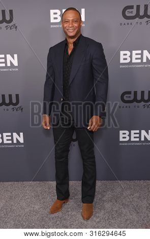 LOS ANGELES - AUG 04:  David Ramsey arrives for the CW's Summer TCA All Star Party on August 04, 2019 in Beverly Hills, CA                