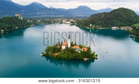 Bled, Slovenia. Aerial Drone View Of Lake Bled With The Pilgrimage Church Of The Assumption Of Maria