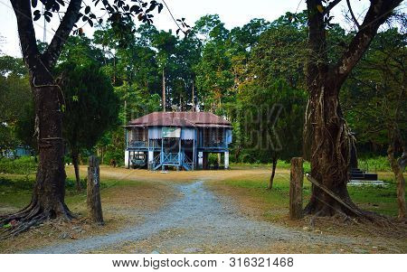 Alipurduar, India- December 4, 2018: View Of A Wooden House At Buxa Tiger Reserve At Doors On A Clou