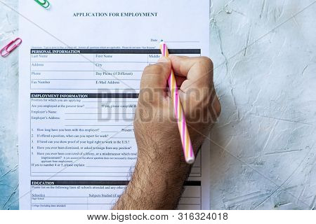 Hand Filling Standard Application For Employment. Hr, Hiring, Applicant Filling Job Application. Hr,