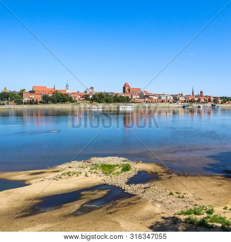 Panoramic View Of Torun City And Wisla (vistula) River In Sunny Day. Poland, Summer 2019