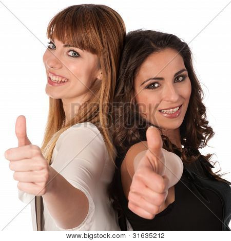 Two Happy Young Women With Thimbs Up