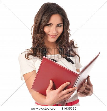 Young Cute Business Woman With A Book In Her Hands