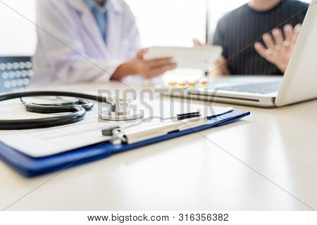 Healthcare And Medical Ethics Concept, Doctor Explains Prescription To Victim Diagnosis  Giving A Co