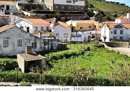 Azenhas Do Mar, Sintra, Lisbon, Portugal- March 19, 2019: Beautiful Narrow Streets, White Houses And