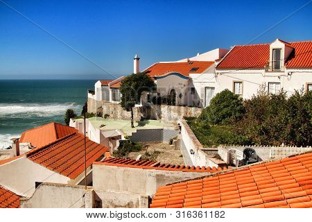 Azenhas Do Mar, Sintra, Lisbon, Portugal- March 19, 2019: Beautiful Narrow Streets, White Houses And