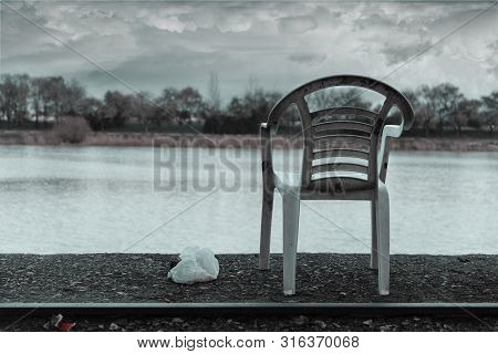 Chair In The Edge Of A River. Post Effects Added.