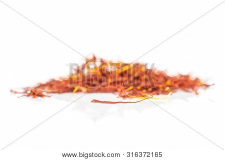 Lot Of Whole Dry Shaffron Thread One In Focus Isolated On White Background