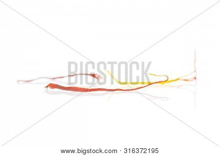 Group Of Three Whole Dry Shaffron Thread Isolated On White Background