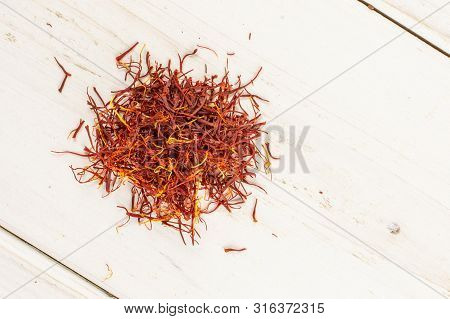 Lot Of Whole Dry Shaffron Thread Heap Flatlay On White Wood