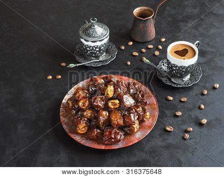 Organic Sweet Dates With Syrup And Black Coffee. Ramadan Kareem Holiday Concept. Top View.