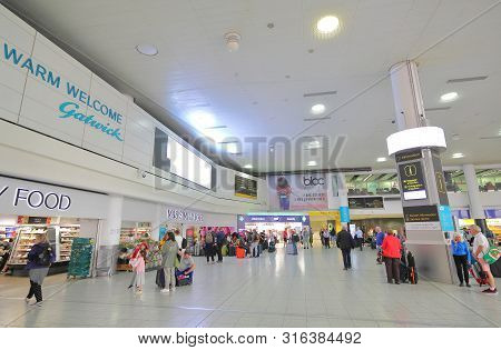 London England - May 31, 2019: Unidentified People Travel At Gatwick Airport London England.
