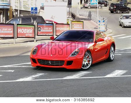 Ukraine, Kiev. June 25, 2013. Ferrari 599. Red Ferrari In The City