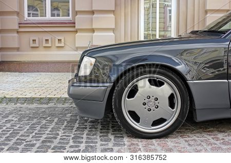Kiev, Ukraine - September 6, 2013: Mercedes E500 W124 Wolf On The Background Of Beautiful Old Houses