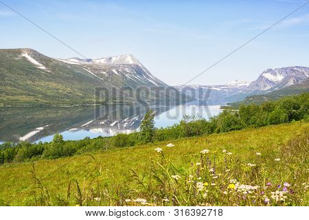 View Of The Norwegian Lake Gjevilvatnet In The Summer