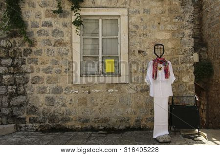 Budva, Montenegro- June 12, 2019: Street Of The Old Medieval City Of Budva With An Exposed Mannequin