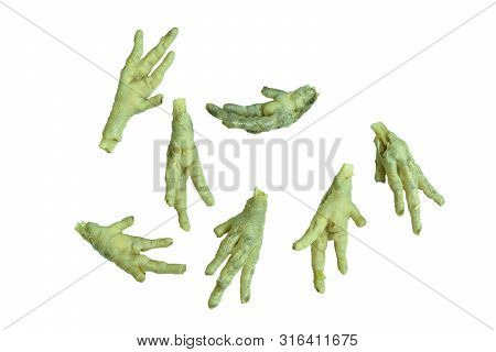Boiled Chicken Feet Arranging On White Background
