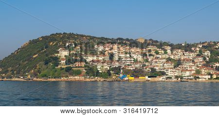 View Of Kinaliada Island From The Sea With Summer Houses. One Of Four Islands Named Princes Islands 