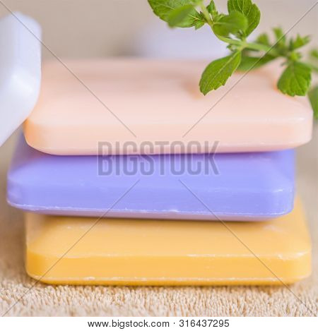 Three Bars Of Soap On A Towel