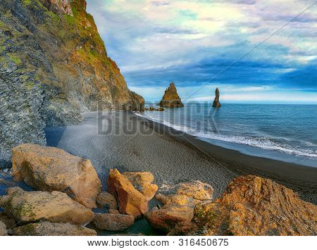 Amazing Landscape With Basalt Rock Formations Troll Toes On Black Beach Reynisfjara Near The Village