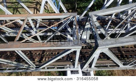 The Connection Of The Upper Part Of The Railroad Tracks On The Bridge.train Bridge Construction View