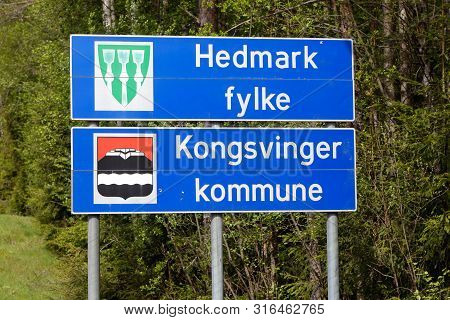 Kongsvinger, Norway - May 26, 2016: Signs At The Border Of The Hedmark County And Kongsvinger Munici