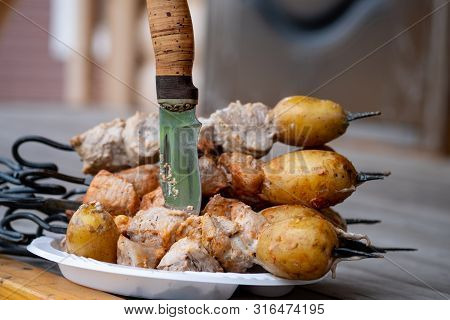 Skewers In The Tandoor. Cooking Kebab Of Meat In A Tandoor.