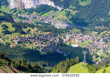 Aerial View Of The Village Of Lauterbrunnen From The Mountain Mannlichen. Switzerland.