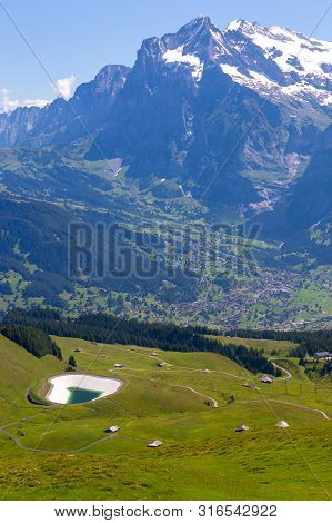 Scenic Aerial View Of The Swiss Alps On A Sunny Day. Mannlichen