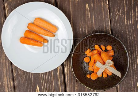 Lot Of Whole Lot Of Pieces Of Stale  Orange Stale Baby Carrot Baby On White Porcelain Plate Flatlay 