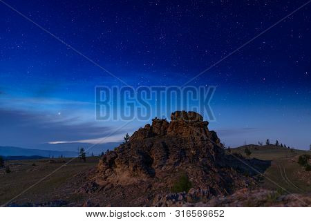 Russia, Lake Baikal, Clouds And Stars Valley Of Spirits