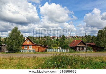 Russian Village In Summer, View Of The Russian Tradtional Country Houses. Village Of Visim, Sverdlov