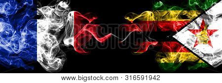 France Vs Zimbabwe, Zimbabwean Smoky Mystic Flags Placed Side By Side. Thick Colored Silky Abstract 