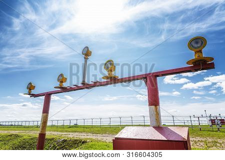 Bioacoustic Bird Scarer At The Airport Against A Bright Minego Sky. Sound Control. Close-up.